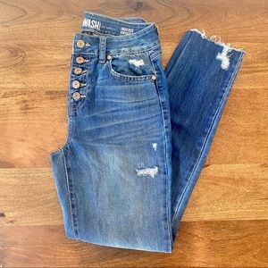 High Rise Distressed Button-Fly Jeans